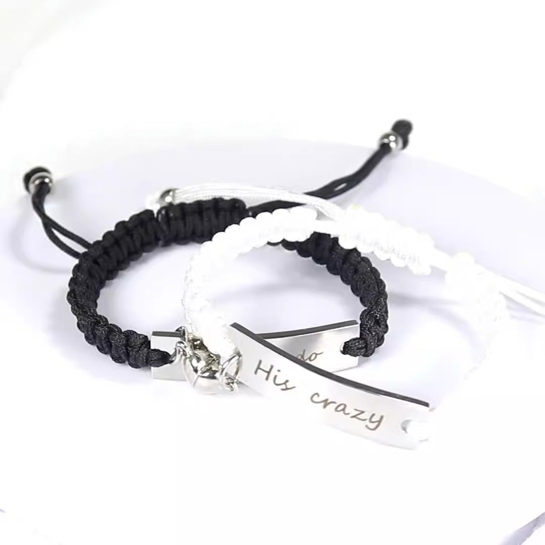 Hand woven magnetic black and white rope with engraved lettering bracelet